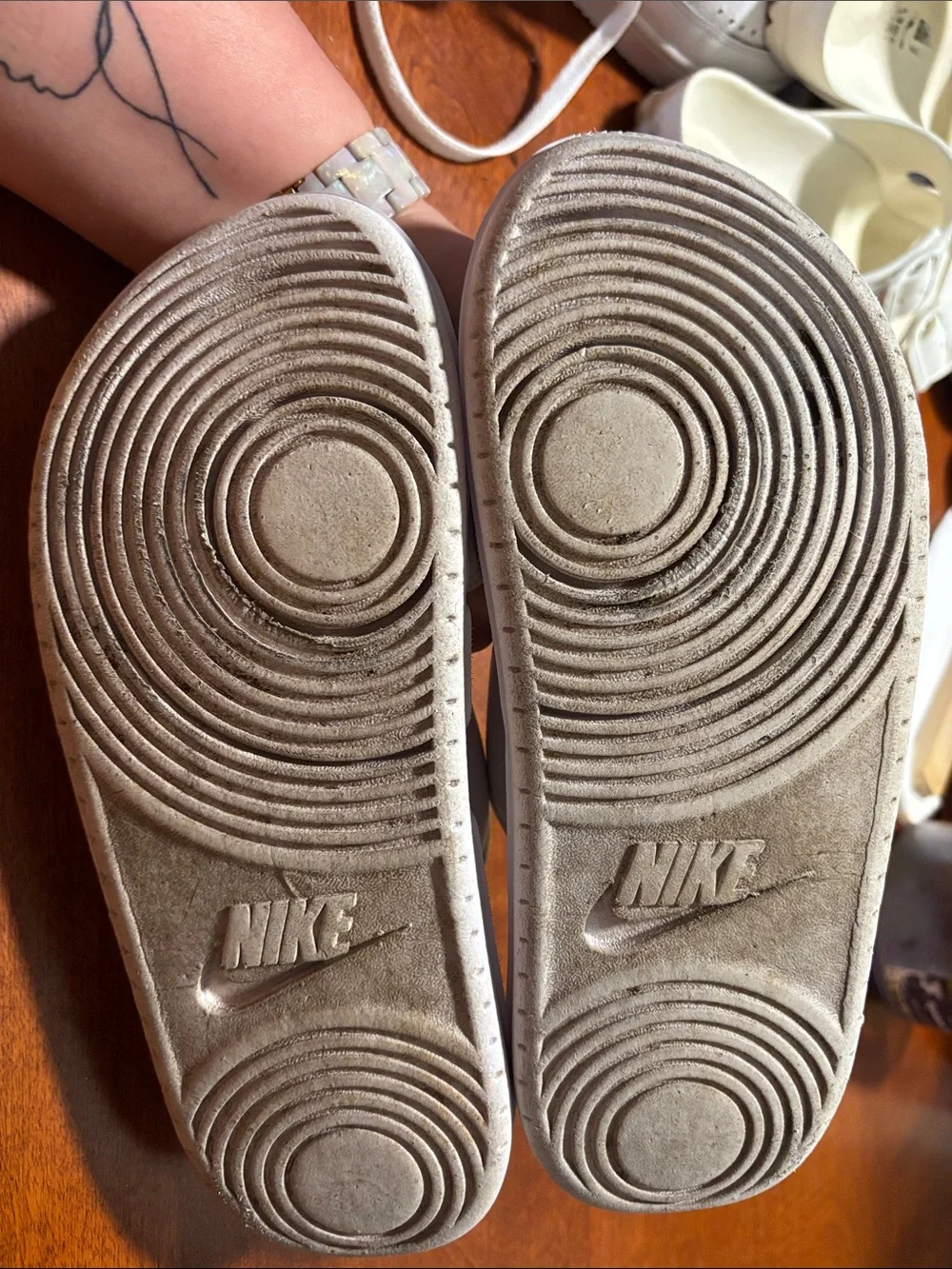 Nike White Slide Sandals with Black Swoosh